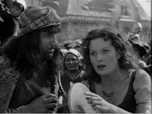 Esmeralda spots an eye staring  maureen o'hara 1939 Hunchback of Notre dame