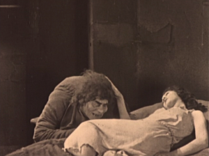 Esmeralda patting Quasimodo on the head Hunchback of Notre Dame 1923 Lon Chaney with Patsy Ruth Miller picture image