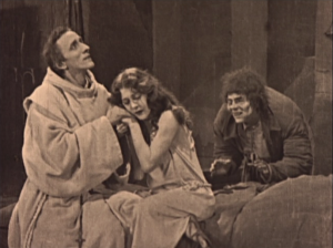 Dom Claude (Nigel de Brulier) with Esmeralda (Patsy Ruth Miller) & Quaismodo (Lon Chaney) 1923 Hunchback of Notre Dame picture image