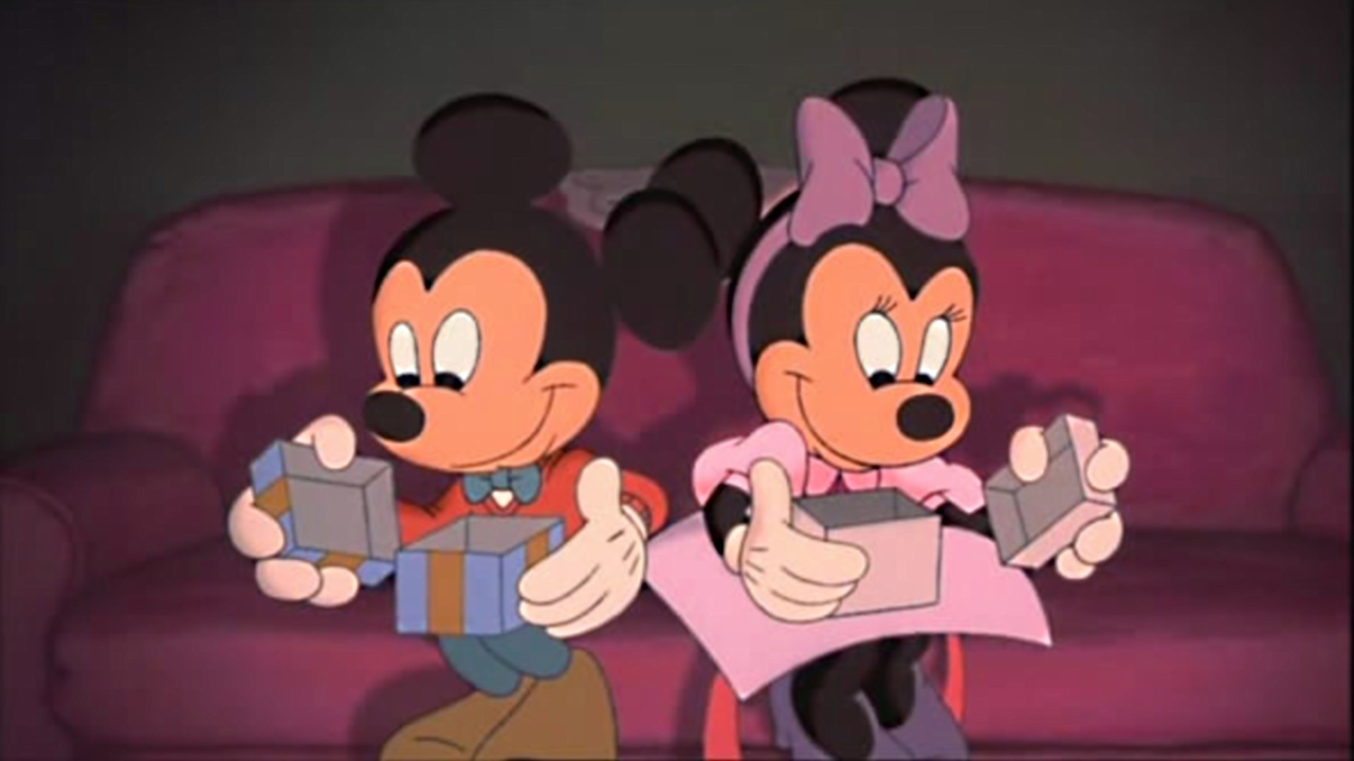 Mickey and Minnie opening their gifts Mickey's Once Upon A Christmas  picture image