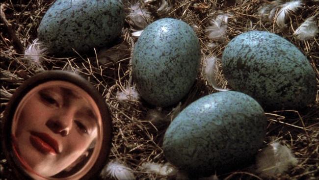 Sarah Patterson as Rosaleen with a nest of eggs In the Company of Wolves 