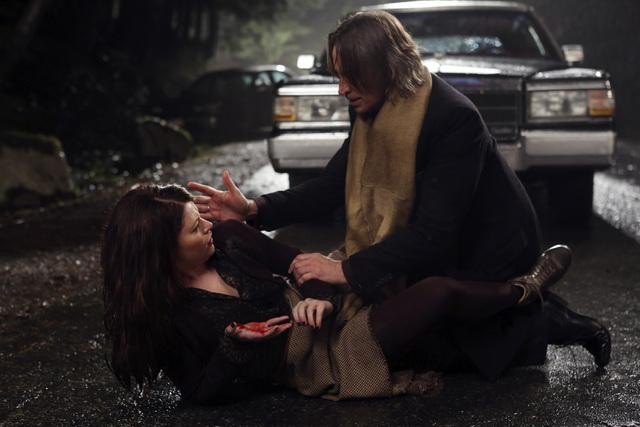 Robert Carlyle as Rumplestiltskin & Emilie de Ravin as Belle Once Upon a Time Season 2 Episode 12 In the Name of the Brother picture image
