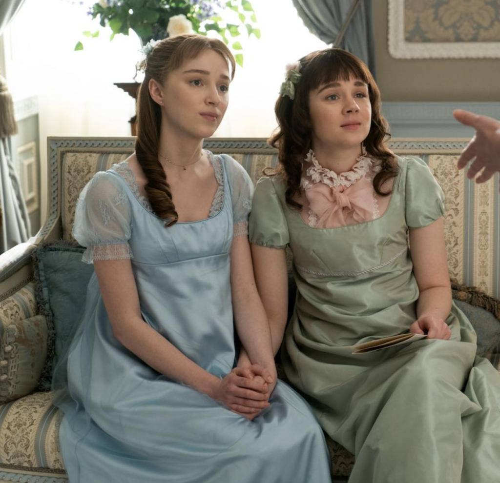 Claudia Jessie as Eloise Bridgerton with Phoebe Dynevor as Daphne, Season 1 Bridgerton (2020), Best Costumes, Gowns, Dresses, and Outfits