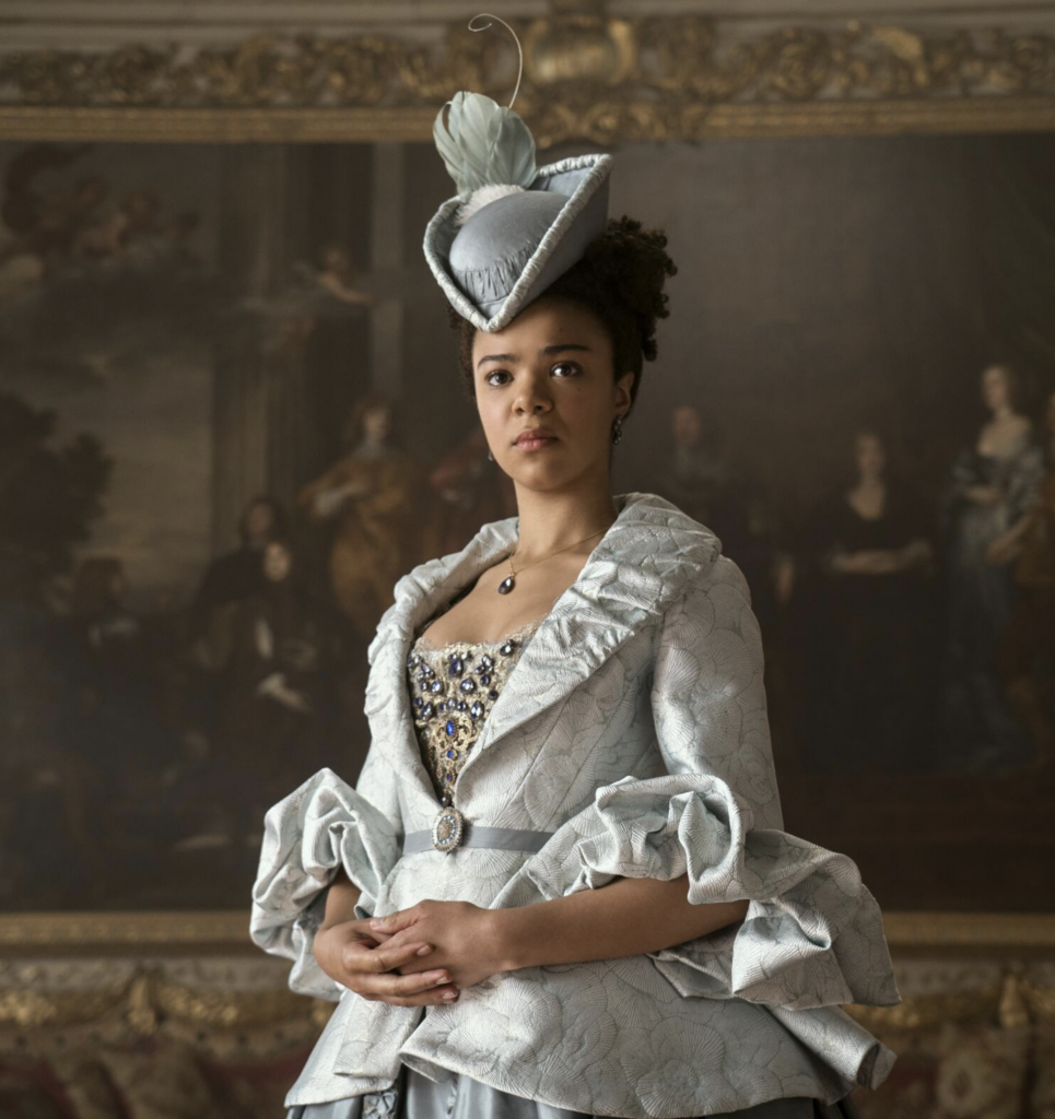 India Amarteifio as young Queen Charlotte in Netflix's “Queen Charlotte: A Bridgerton Story” With costume designed by Lyn Elizabeth Paolo & Laura Frecon