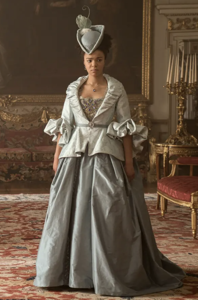 India Amarteifio as young Queen Charlotte in Netflix's “Queen Charlotte: A Bridgerton Story” The Carriage Gown