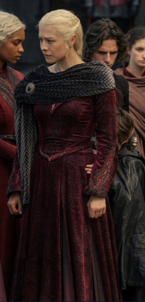 Emma D'Arcy as Rhaenyra Targaryen in Season 2 of HBO's “House of the Dragon” Ranking Rhaenyra Costumes, Dresses, & Outfits Red & Black Velvet gown