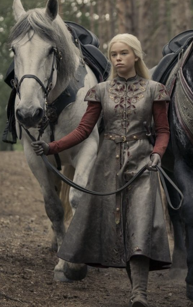 Rhaenyra Targaryen wearing The Hunting Outfit in Season 1 of "House of the Dragon" Ranking Rhaenyra Costumes, Dresses, & Outfits