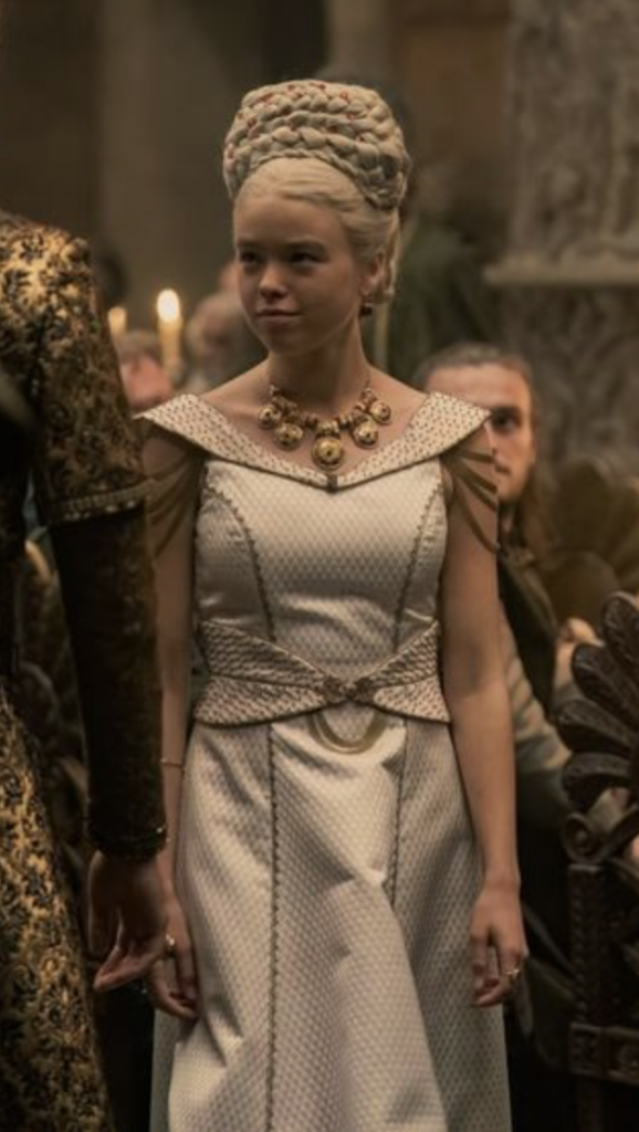 Rhaenyra Targaryen wearing The Wedding Gown in Season 1 of "House of the Dragon" Ranking Rhaenyra Costumes, Dresses, & Outfits