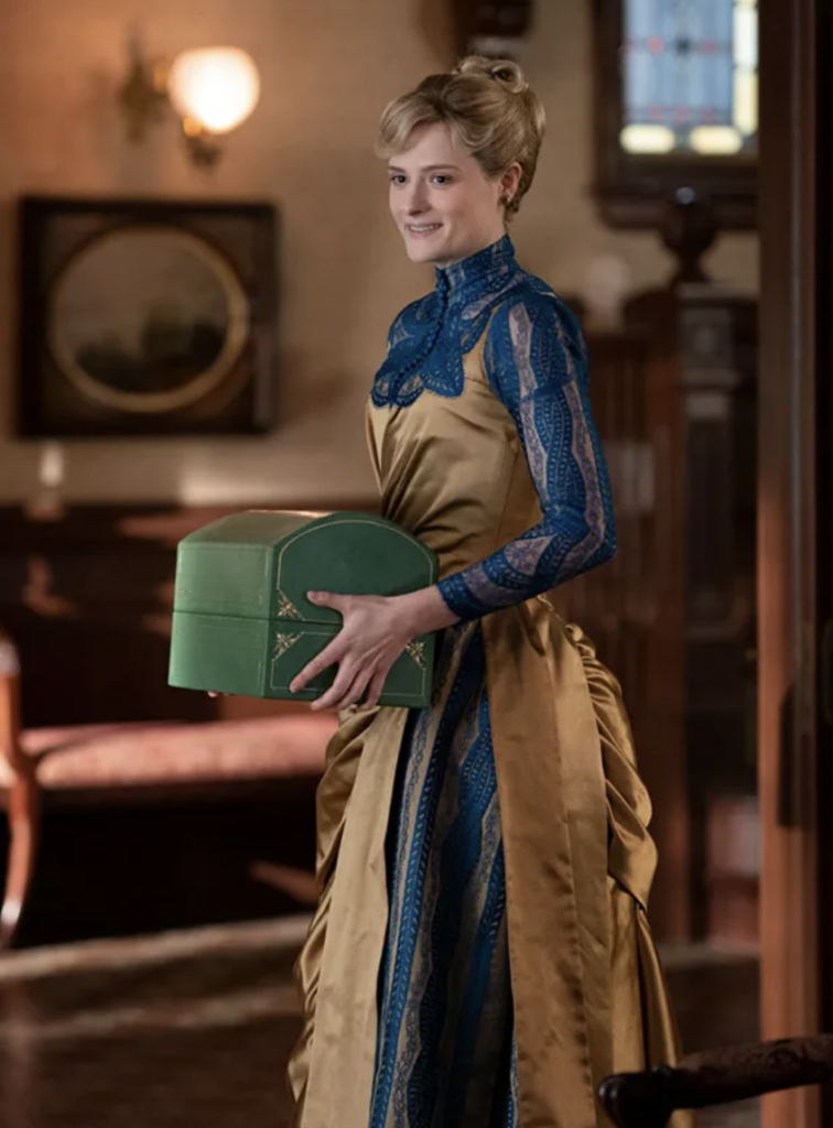 Louisa Jacobson as Marian Brook "The Gilded Age" Season 1 Ranking costumes, gowns, dresses and outfits, The Gold and Blue Lace Evening Dress