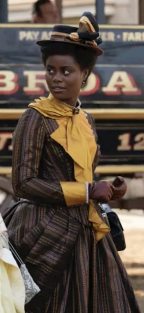 Denée Benton as Peggy Scott "The Gilded Age" Season 1 Ranking costumes, gowns, dresses and outfits, The Yellow and Brown Striped Dress