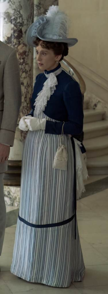 Taissa Farmiga as Gladys Russell "The Gilded Age" Season 3 Ranking costumes, gowns, dresses and outfits, Newport Striped Dress