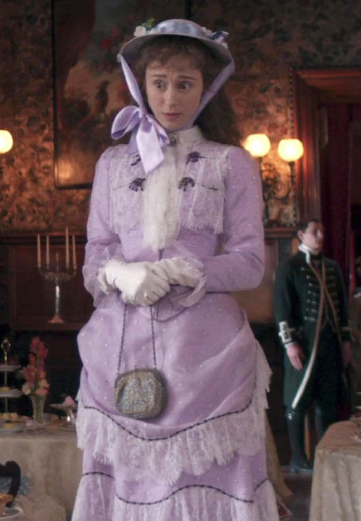 Taissa Farmiga as Gladys Russell "The Gilded Age" Season 1 Ranking costumes, gowns, dresses and outfits, The Purple and White Lace Dress