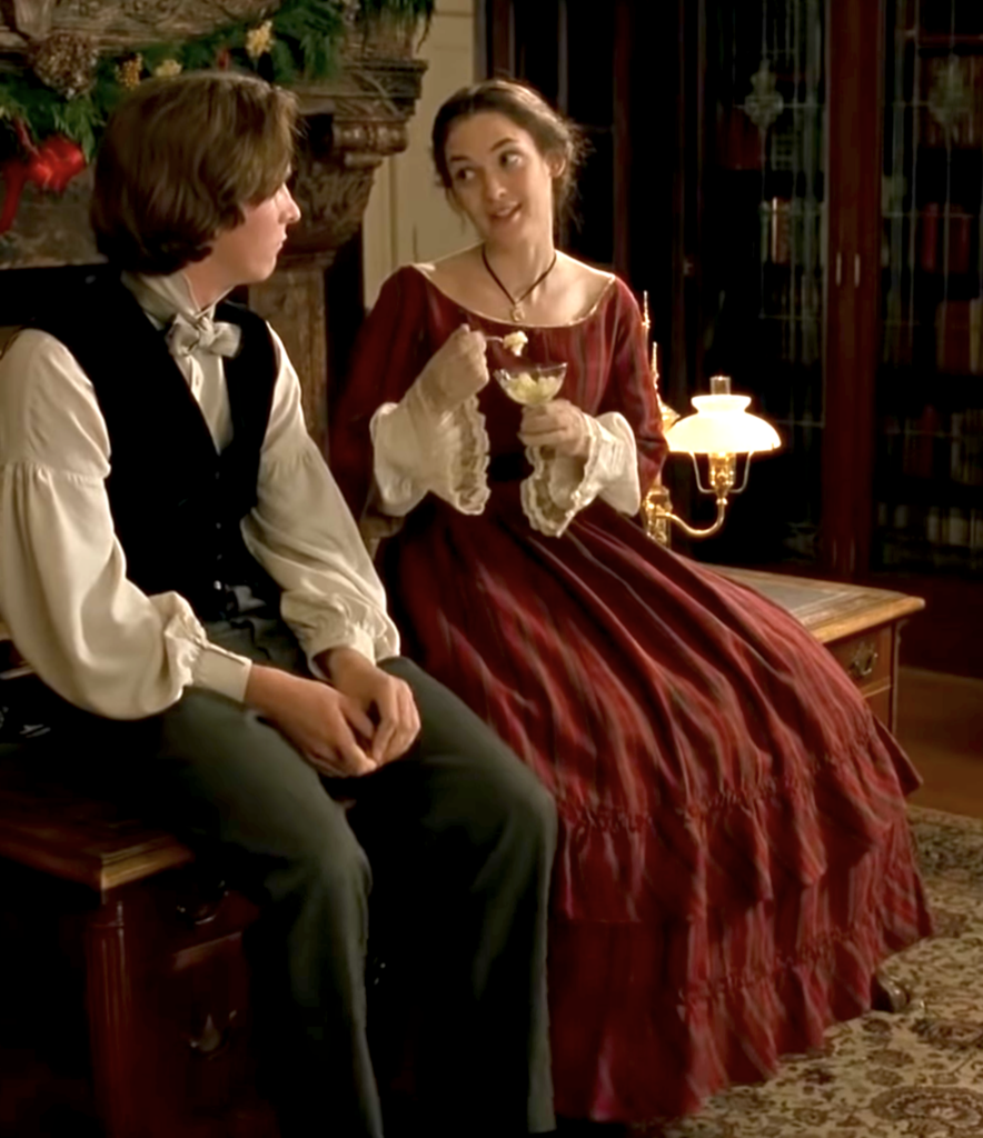 Winona Ryder as Jo March in "Little Women" (1994) Best Burgundy & Dark Red Costumes, Gowns, & Dresses from Period Piece Dramas Movies