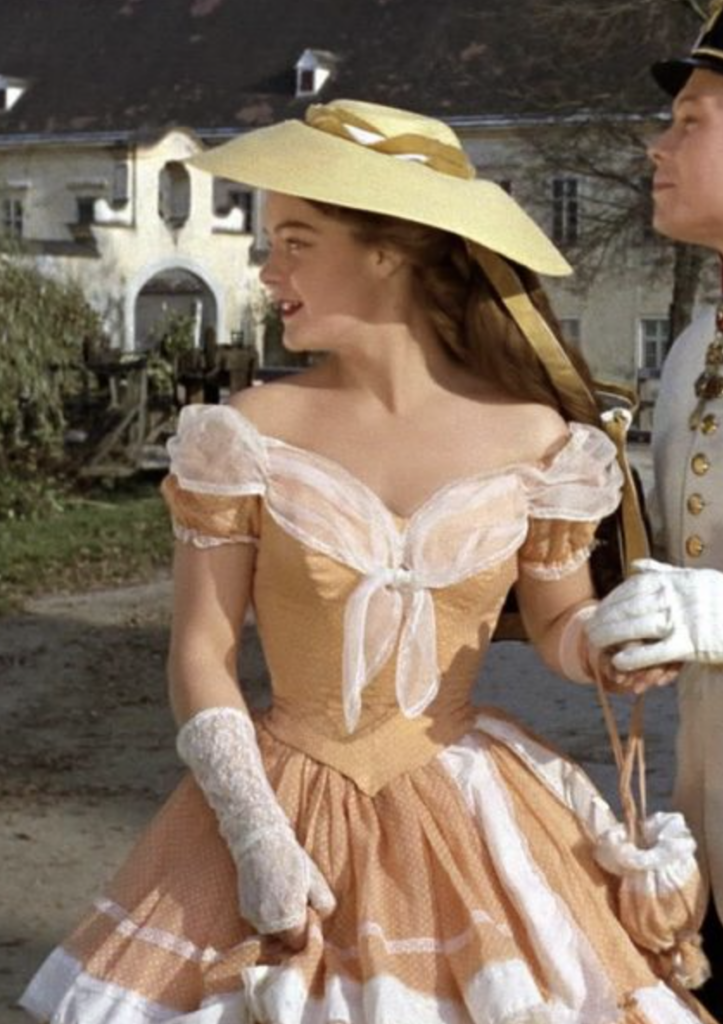 Romy Schneider as Sissi from Sissi (1955) Best Orange Costume, Gowns, & Dresses from Period Piece Dramas Movies