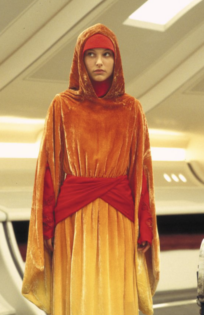 Natalie Portman as Padmé as a handmaiden, "Star Wars Episode I: The Phantom Menace" (1999) Best Orange Costumes, Gowns, & Dresses from Fantasy & Sci-fi Movies