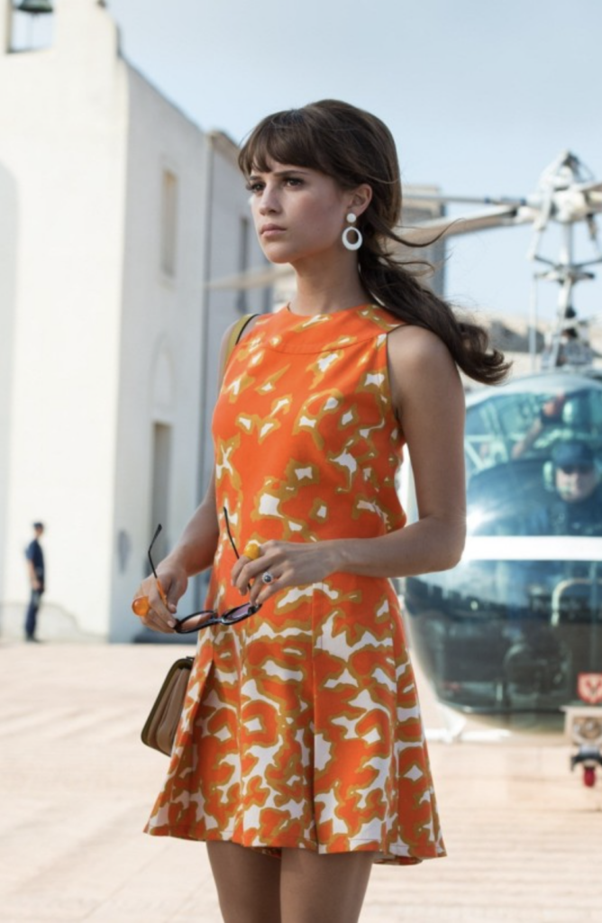 Alicia Vikander as Gaby, "The Man from U.N.C.L.E." (2015) Best Orange Costume, Gowns, & Dresses from Period Piece Dramas Movies